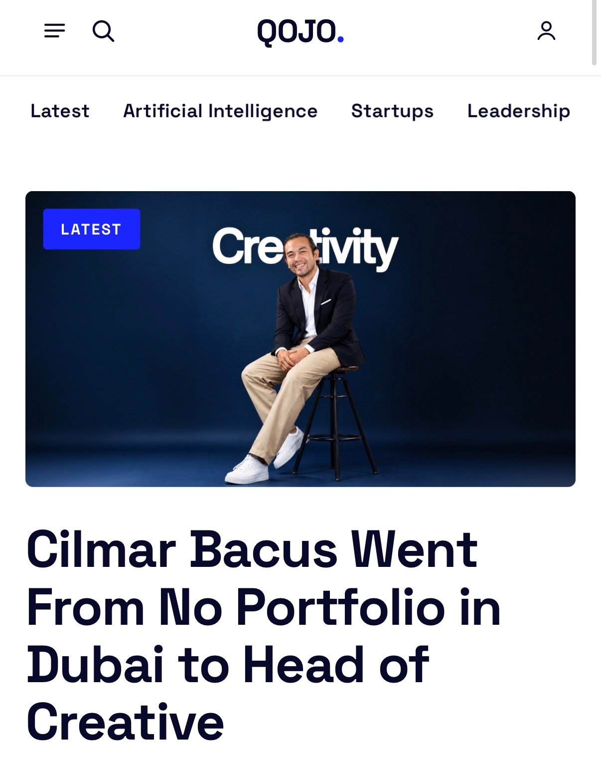 Screenshot of Qojo Media article Cilmar Bacus Went From No Portfolio in Dubai to Head of Creative, with studio portrait